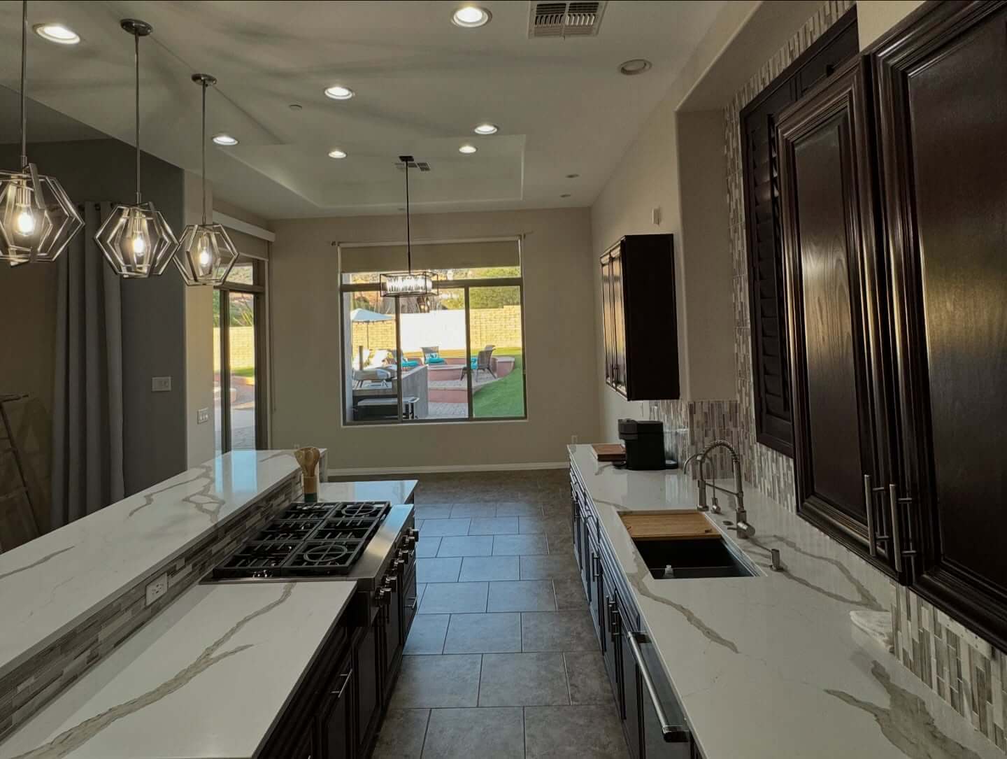 A freshly painted kitchen  with modern, neutral tones enhancing the home’s aesthetic. We used Sherwin Williams Paints.