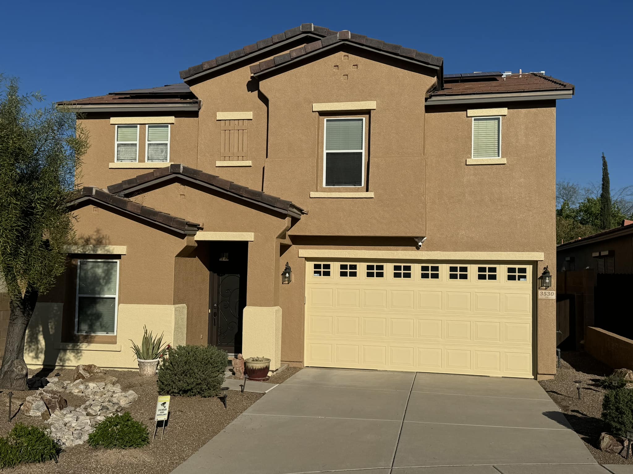 Experienced Tucson painters applying high-quality paint for a flawless finish on residential and commercial properties.